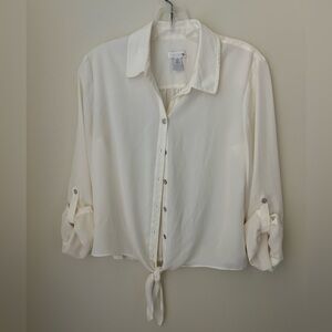 Chico’s 100% polyester blouse. . Feels and looks like silk.  Size 0 or 6.